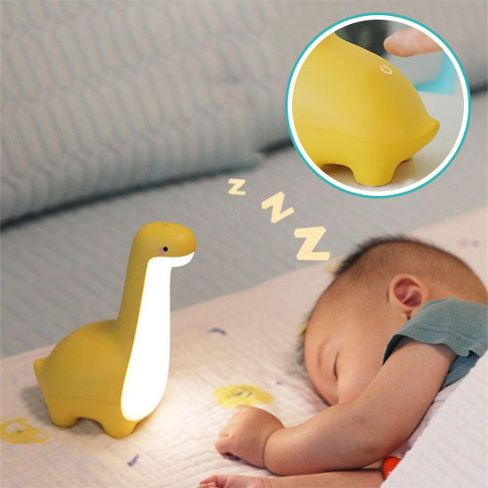 veilleuse bébé dinosaure jaune bébé dort avec