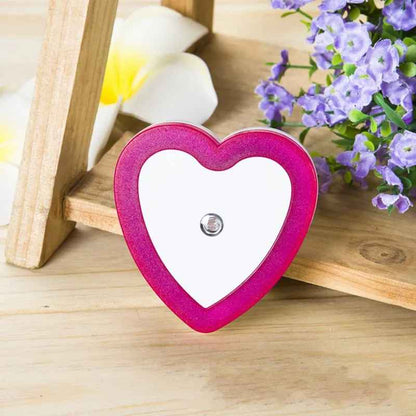 veilleuse bébé en cœur rose éteinte