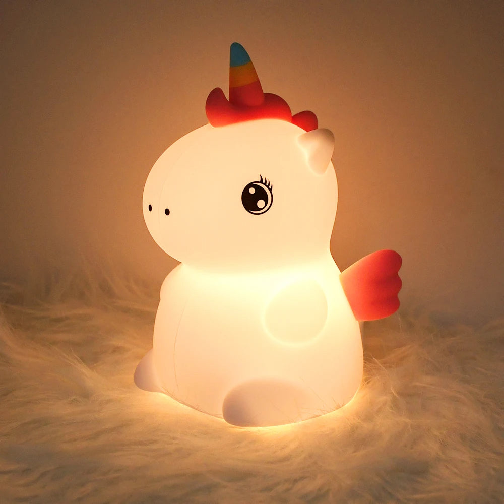 veilleuse bébé licorne sur oreiller